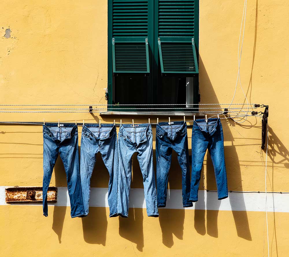 Denim jeans on a line. Photo: Ricardo Gomez Angel/Unsplash