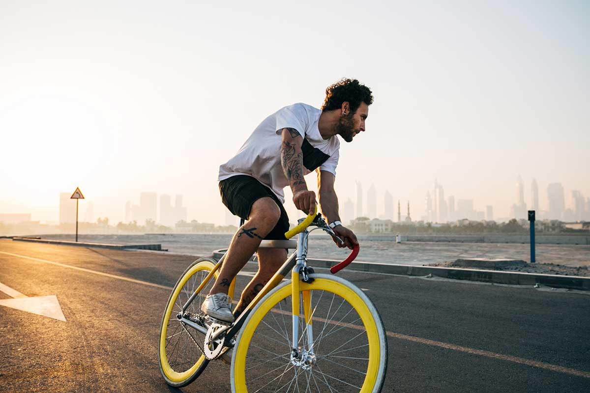 Man riding bike. Photo: Jonny Kennaugh/Unsplash