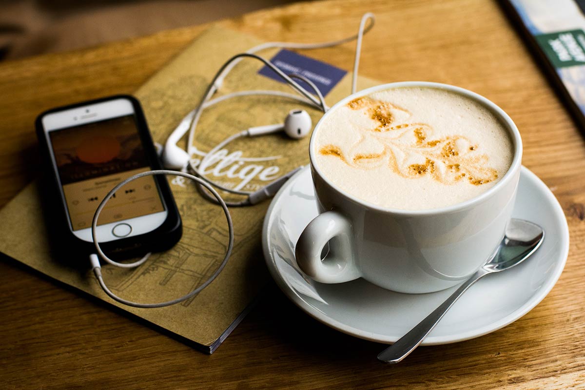Coffee and a podcast. Photo: Juja Han / Unsplash